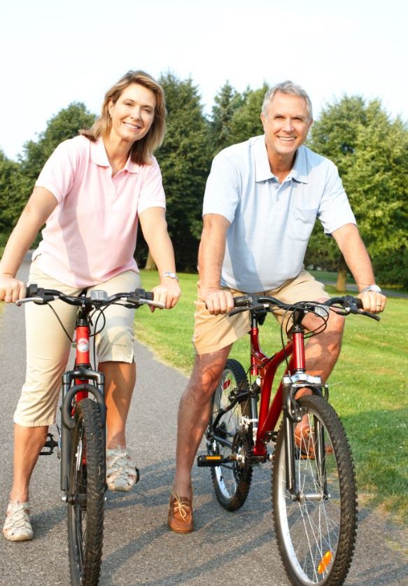 Happy couple cycling